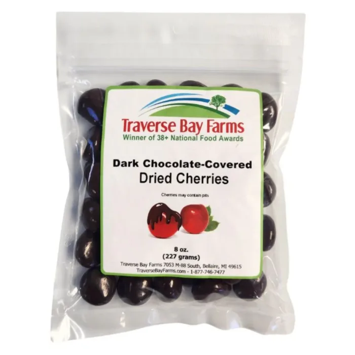Traverse Bay Farms 8 oz bag of dark chocolate covered dried cherries, made with Michigan-grown Montmorency cherries