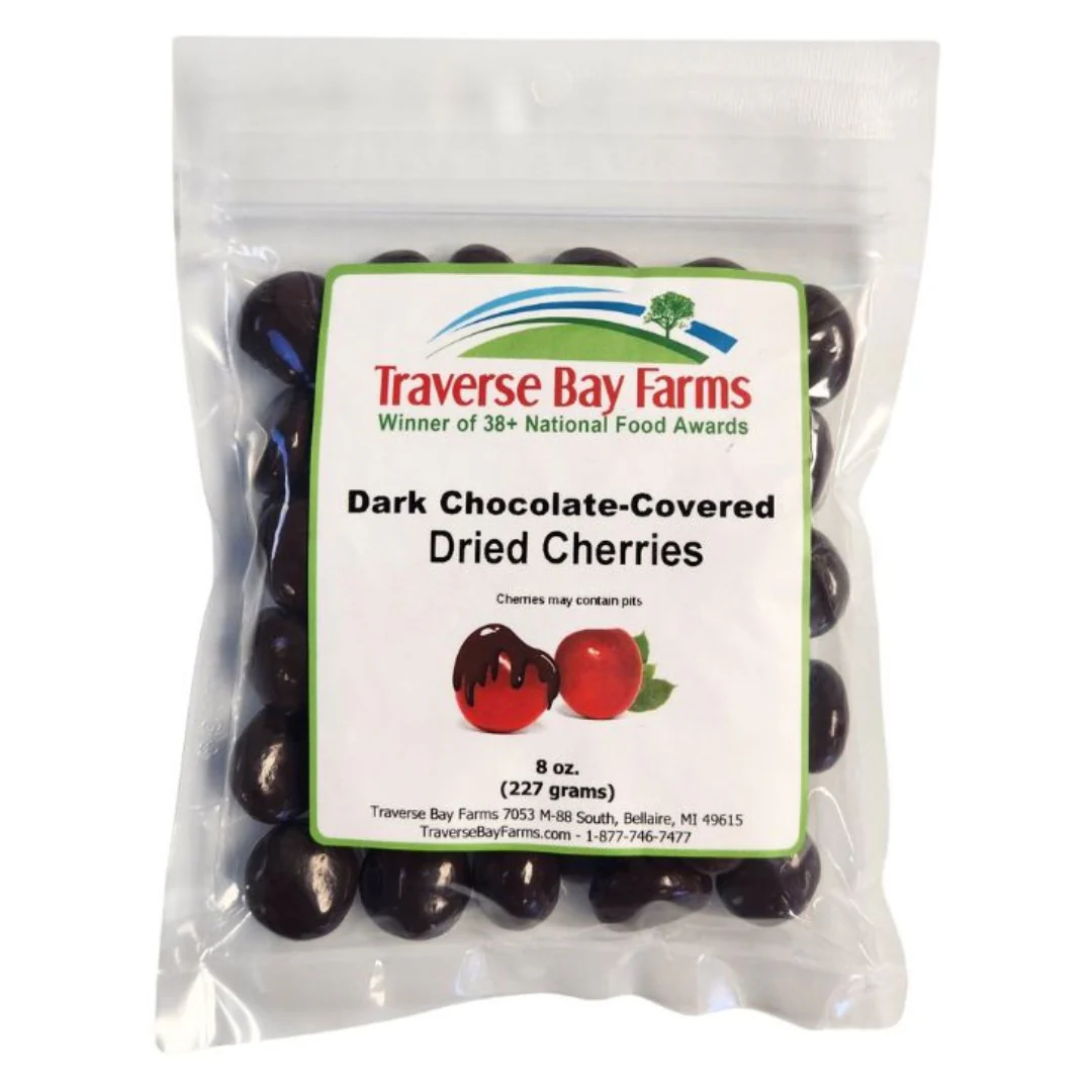 Traverse Bay Farms 8 oz bag of dark chocolate covered dried cherries, made with Michigan-grown Montmorency cherries